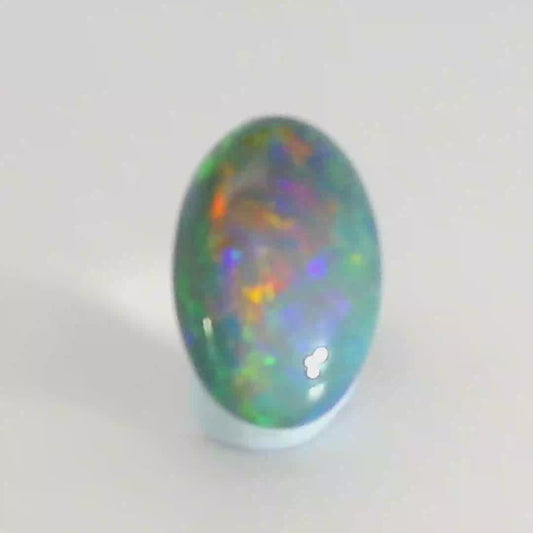 Vibrant Opal Gemstone in Hand
