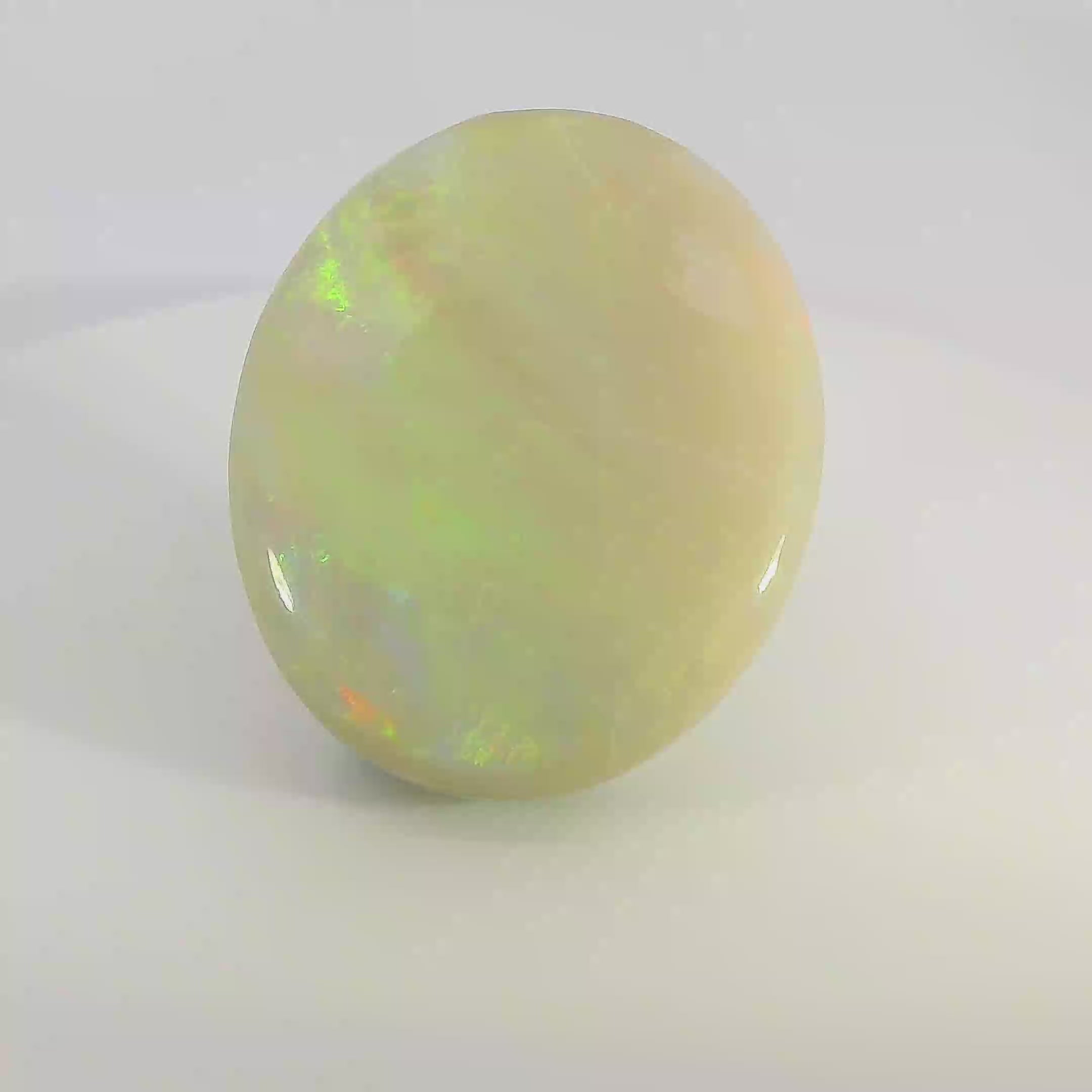 Vibrant Opal Gemstone in Hand