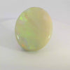 Vibrant Opal Gemstone in Hand