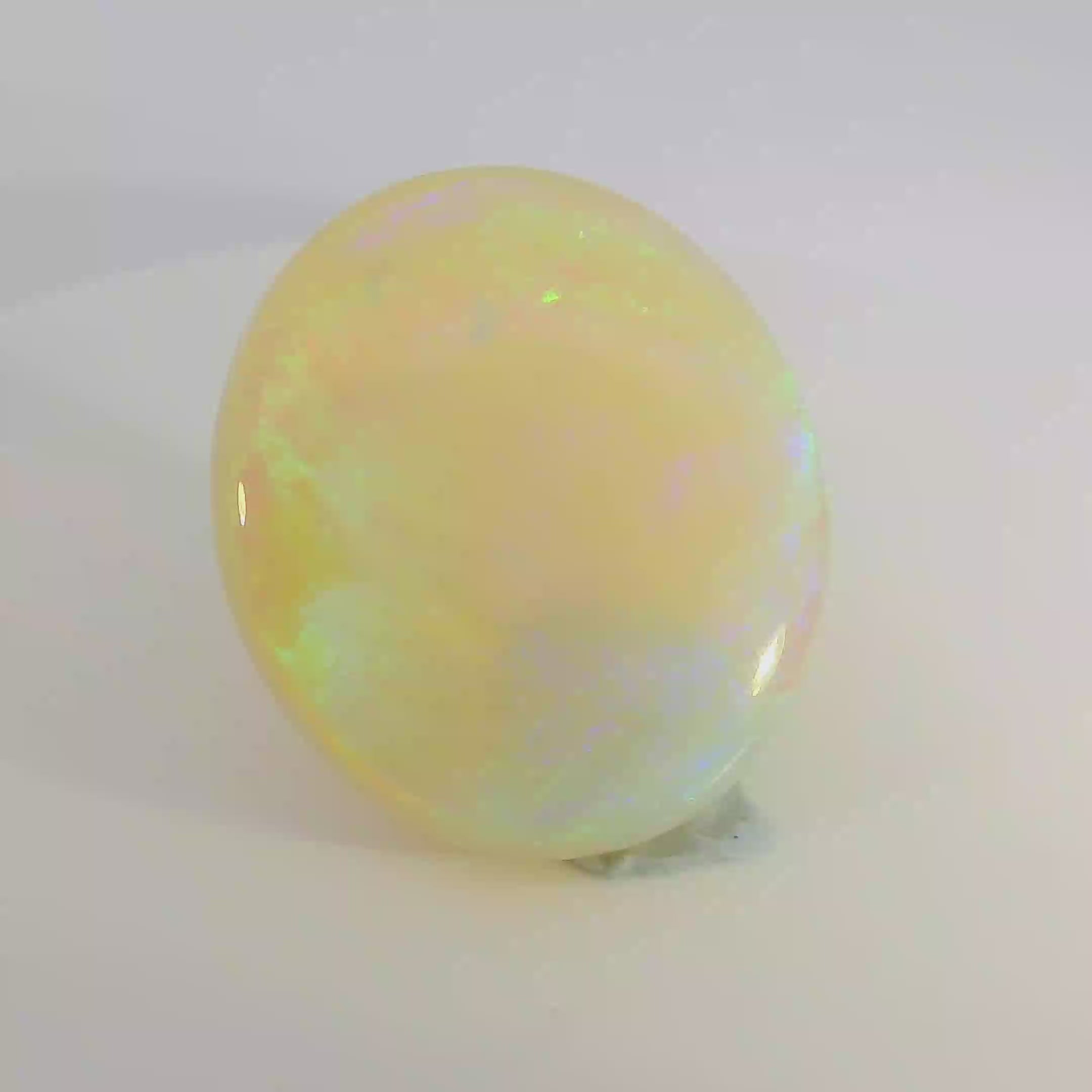 Vibrant Opal Gemstone in Hand