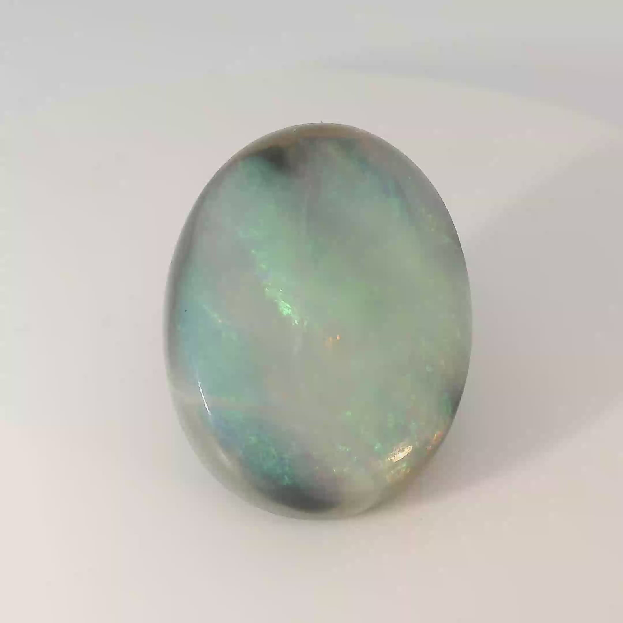 Vibrant Opal Gemstone in Hand