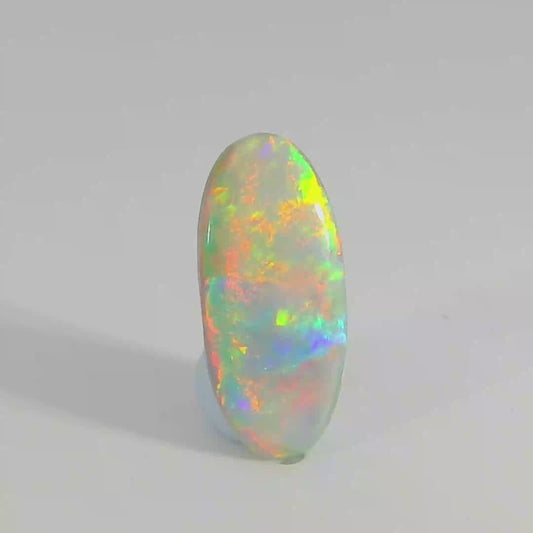 Vibrant Opal Gemstone in Hand