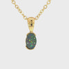 Video of a Gold pendant with a colourful opal gemstone on a white background