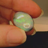 Vibrant Opal Gemstone in Hand