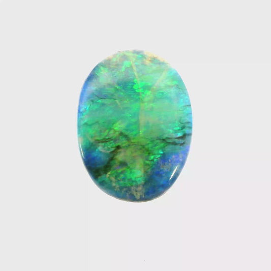Video of a Multicoloured opal stone on a white background