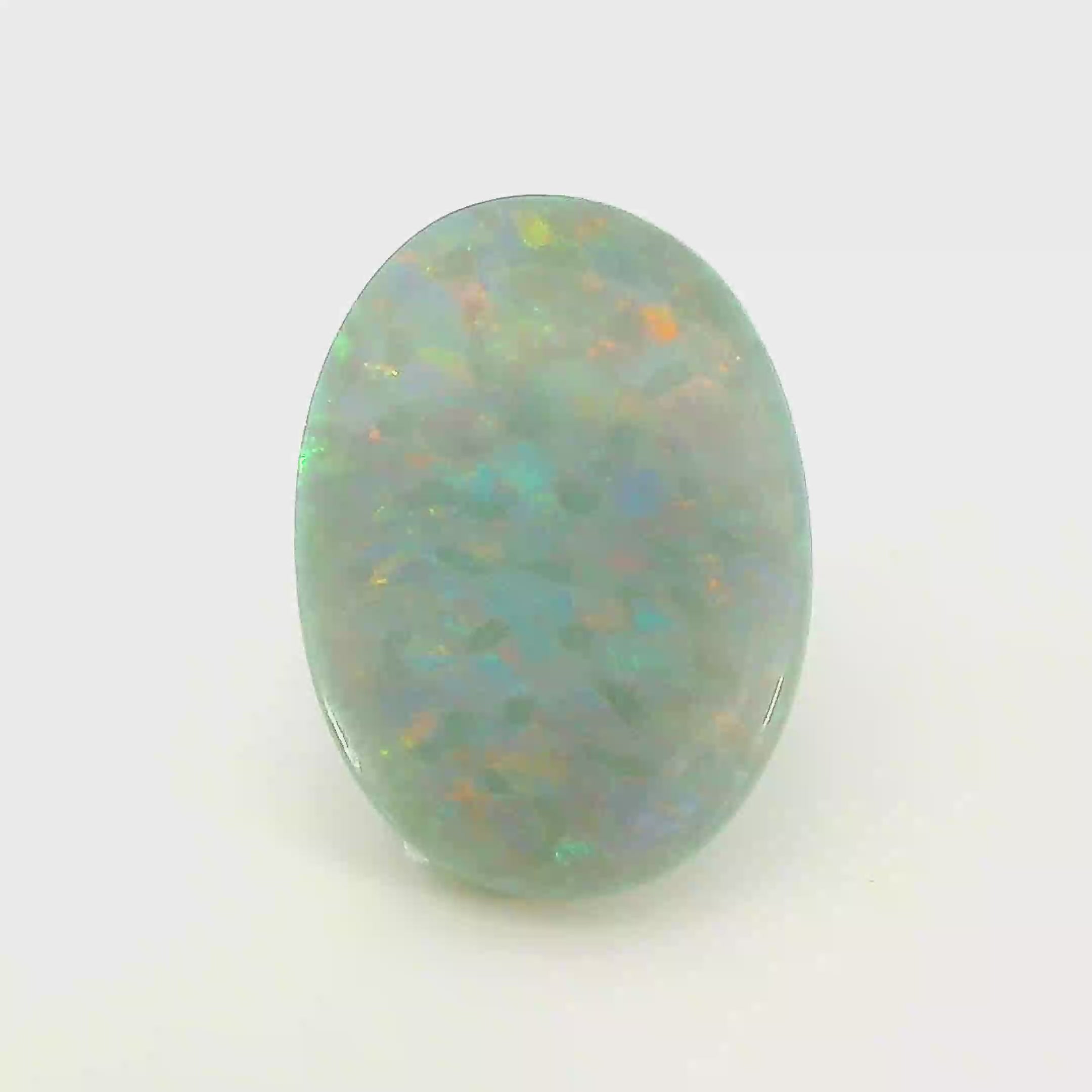 Vibrant Opal Gemstone in Hand