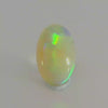 Vibrant Opal Gemstone in Hand