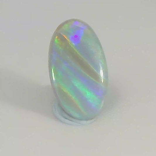 Video of a Multicoloured opal stone on a white background