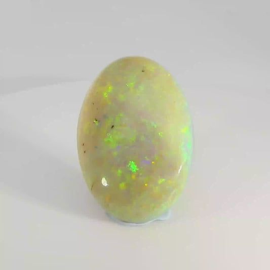 Vibrant Opal Gemstone in Hand