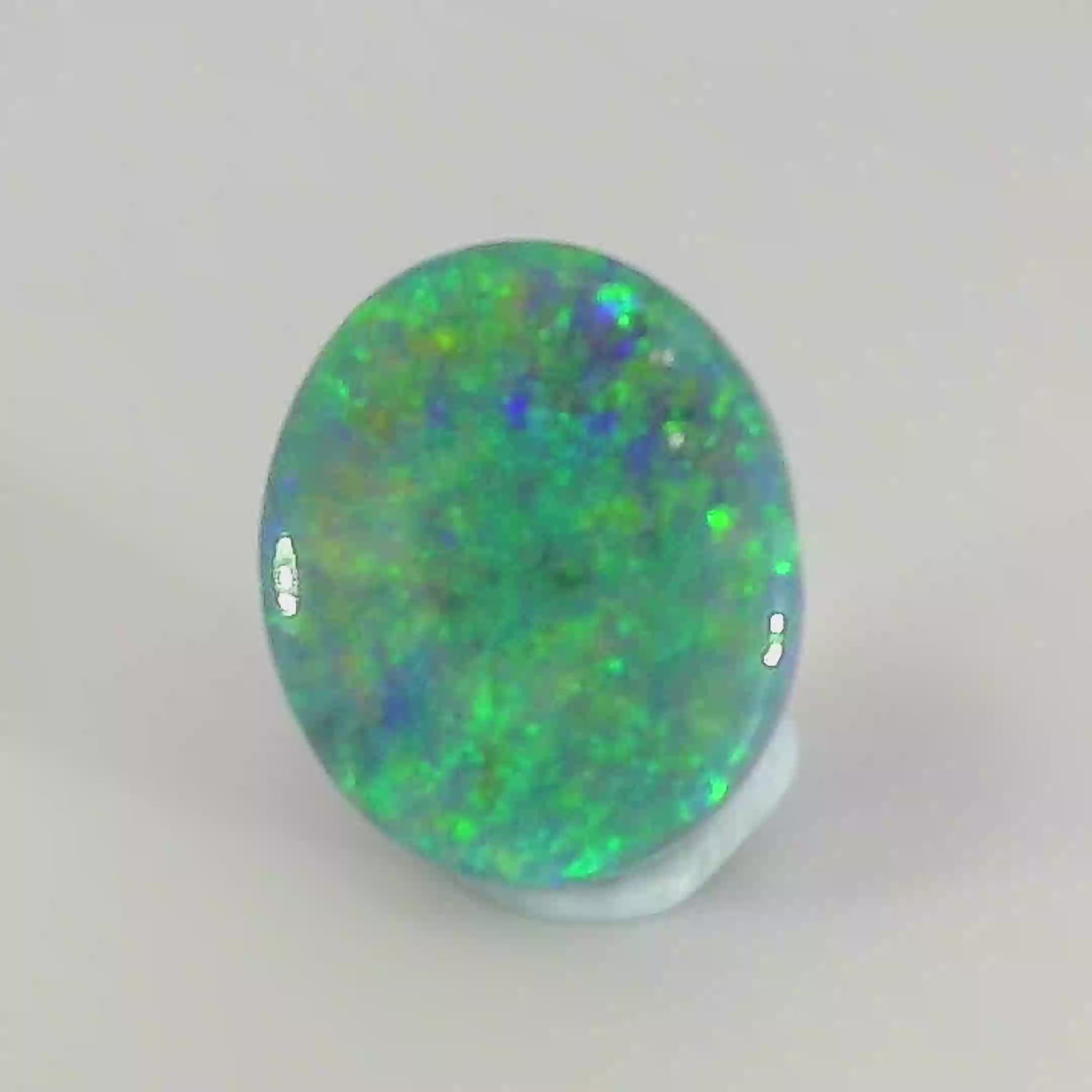 Vibrant Opal Gemstone in Hand