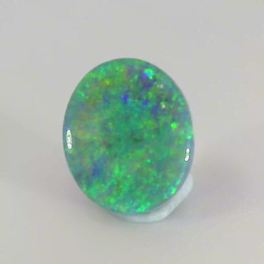Video of a Multicoloured opal stone on a white background