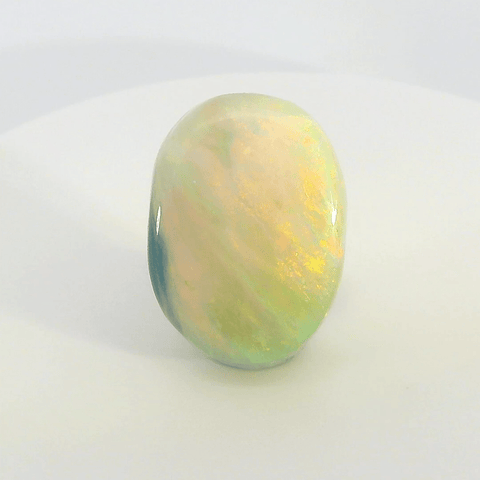 Vibrant Opal Gemstone in Hand - Australian Opal Cutters and Pearl Divers