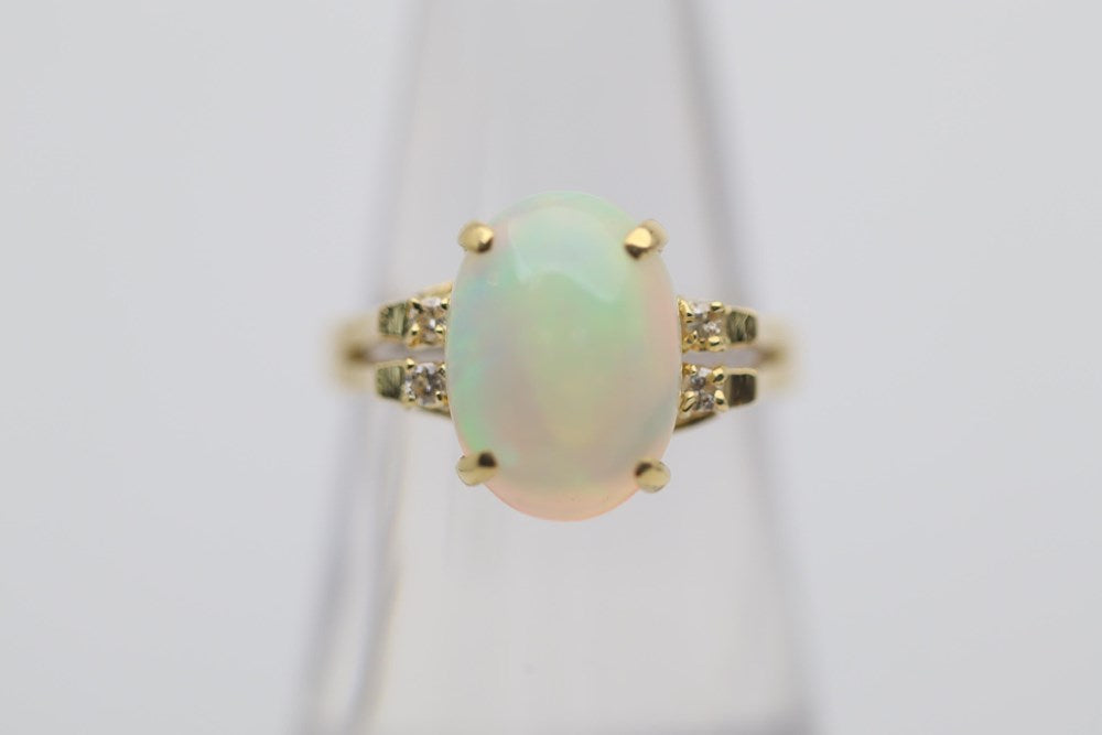 Australian Light Opal set in 18k Gold ring with 4 Diamonds