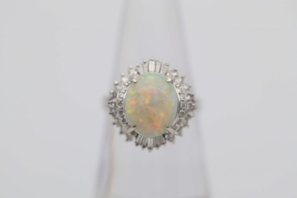 Australian Light Opal 2.76 cts set in a 900 Platinum Ring Haloed with Diamonds