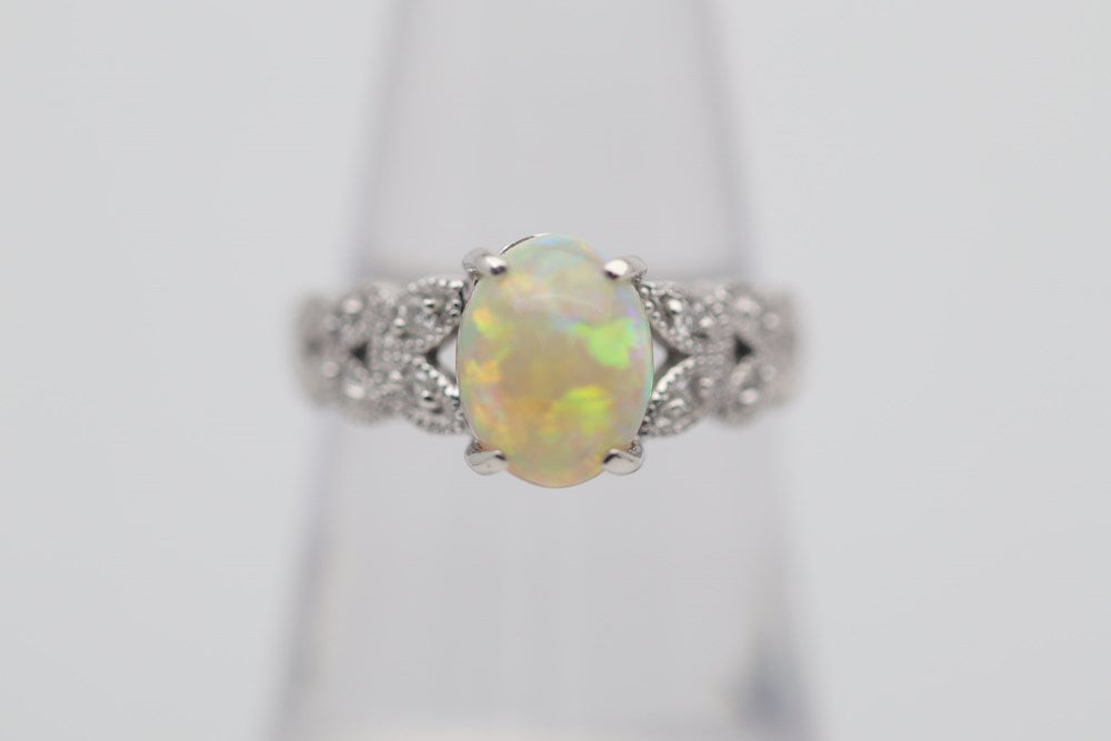 Australian Light Crystal Opal 1.59 Cts set in 18k Gold Ring with 8 Diamonds in Leaf Patterns